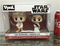 Vynl Star Wars Luke + Leia bobble-heads - sealed