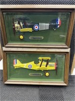 2 framed vintage pressed metal airplanes