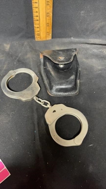 handcuffs (no key) and case