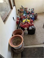 Variety of fuel cans and assorted toys