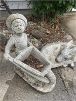 Concrete wheelbarrow with boy & deer