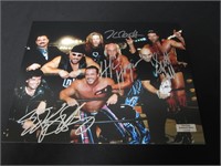 WCW N.W.O. SIGNED 8X10 PHOTO HERITAGE COA