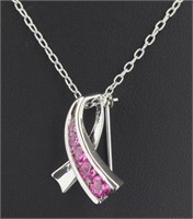 Graduated Pink Topaz Journey Pendant