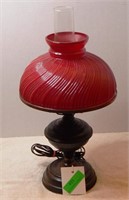 Red globe glass table lamp, works