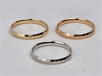3 grams (3) 14k gold bands/rings