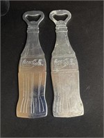 Two Coca Cola bottle openers