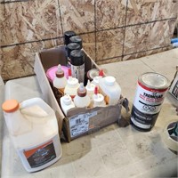 Part Cans of various wood glues and paint