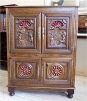 French Figural Carved Breton Oak Cabinet.