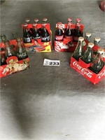 COKE  BOTTLES, FULL AND EMPTY