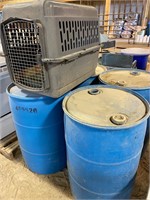 PLASTIC DRUMS AND DOG CRATE