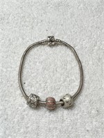 Sterling Moress bracelet with charms.