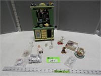 Miniature cupboard; tea set; watering cans; figuri