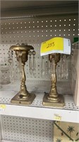 Two antique brass candlesticks