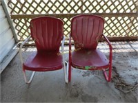 2 red metal chairs