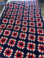 Red, white, and blue granny square afghan