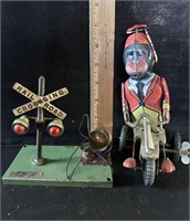 VINTAGE METAL TOYS, WIND-UP TRIKE RIDING MONKEY