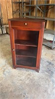 Glass fronted bookcase