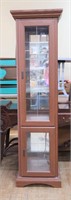 Mirror back lighted curio cabinet