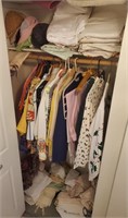 703 - CLOSET FULL OF BLANKETS, CLOTHES , HATS