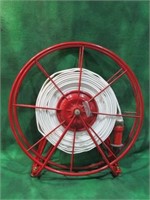 UNIQUE FIRE HOSE W/ WALL MOUNT. RED METAL