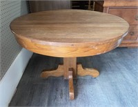 Vintage oak table on pedestal. Top needs glue.