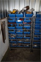 wire shelf and blue buckets and contents