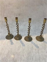 4 small copper candle holders
