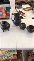 4 primitive black pottery pieces