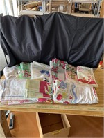 Assorted flour sack table cloths
