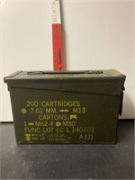 Metal ammo box with gun cleaning supplies
