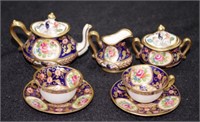 Good Crown Staffordshire miniature tea set