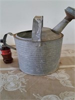 Galvanized watering can