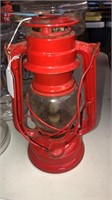 Red winged wheel lantern