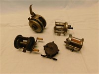 5 old fishing reels.