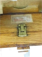 Vintage wooden shoe shine box with polishes,