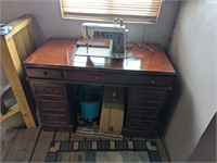Singer Sewing Machine & Cabinet - 40" wide