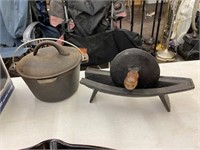 Cast iron dutch oven and cutter and stand