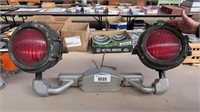 pair of railroad signal lights with mounting