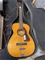 Stella Harmony acoustic guitar.