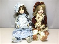 2 oversized articulated posable porcelain dolls,