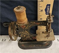 old miniature sewing machine