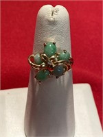 Jade ring. Set in 14 karat gold. Size 7. Has a