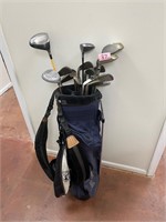 Lot of golf clubs and bag B