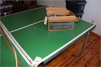 ping pong table and paddles