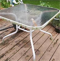 Glass top patio dining table, no umbrella