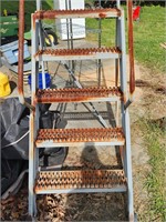 Rustic industrial rolling ladder