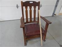 Antique rocking chair with cushioned seat