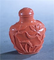 Chinese carved coral snuff bottle.