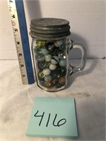 Jar of marbles with zinc lids