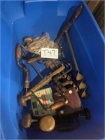 Plastic bin of old woodworking tools